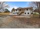 A view of the back of the house showing stairs and access doors at 1601 Mooresville Rd, Salisbury, NC 28147