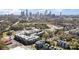 Aerial view of cityscape, parks, and surrounding neighborhood of modern townhome community at 1659 Duckworth Ave, Charlotte, NC 28208
