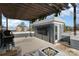 Rooftop patio with pergola, outdoor television, seating area and stainless steel grill at 1659 Duckworth Ave, Charlotte, NC 28208