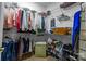Organized walk-in closet with shelving for clothes, shoes, and accessories at 1668 Onyx Rdg # 116, Fort Mill, SC 29708