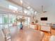 Open-concept dining area with modern lighting, large glass doors, and plenty of natural light at 18 Pickett Ave, Spencer, NC 28159
