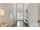Bright and airy foyer with soaring ceilings, hardwood floors, and elegant decor at 20601 Island Forest Dr, Cornelius, NC 28031