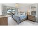 Serene main bedroom features a private patio overlooking the lake at 20601 Island Forest Dr, Cornelius, NC 28031
