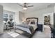 Serene main bedroom with large bed, accent pillows, bedside tables, and natural light from the window at 20601 Island Forest Dr, Cornelius, NC 28031