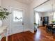 Elegant dining room featuring hardwood floors, a stylish light fixture, and ample natural light at 225 Marion St, Rock Hill, SC 29730