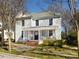 Charming two-story home with a welcoming front porch and landscaped front yard at 225 Marion St, Rock Hill, SC 29730