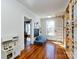 Bright playroom featuring hardwood floors, a play kitchen, climbing wall, and a blue sofa at 225 Marion St, Rock Hill, SC 29730