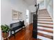 Beautiful staircase with hardwood steps and dark wood accents at 225 Marion St, Rock Hill, SC 29730