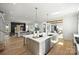 Modern kitchen with island, ample counter space, open to living and dining areas for seamless entertaining at 2325 Winthrop Ave, Charlotte, NC 28203