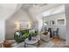 Cozy living room features vaulted ceilings, comfortable seating, and stylish decor for relaxing and entertaining at 2325 Winthrop Ave, Charlotte, NC 28203
