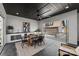 Covered outdoor dining area with kitchenette, offering seamless indoor-outdoor living at 2325 Winthrop Ave, Charlotte, NC 28203