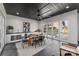 Outdoor dining area with black ceiling and kitchenette offering seamless indoor-outdoor lifestyle at 2325 Winthrop Ave, Charlotte, NC 28203