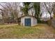 Backyard with storage shed, wooden deck and fenced yard at 2577 Kingston St, Newton, NC 28658