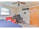 Bright bedroom setup with space for a home office or study area with natural light at 2577 Kingston St, Newton, NC 28658