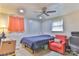 Comfortable bedroom with cozy chair and natural light from two windows at 2577 Kingston St, Newton, NC 28658