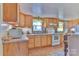 Bright kitchen featuring natural wood cabinets and floors at 2577 Kingston St, Newton, NC 28658