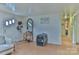 Bright living room with wood-look floors, hall access, and a comfortable seating area at 2577 Kingston St, Newton, NC 28658