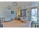 Cozy living room with comfortable seating, natural light, and wood-look floors at 2577 Kingston St, Newton, NC 28658