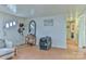 Bright living room with wood-look floors, hall access, and a comfortable seating area at 2577 Kingston St, Newton, NC 28658