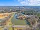 Aerial view showcasing the surrounding landscape and lake near downtown at 2913 Archdale Dr, Charlotte, NC 28210