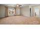 Large, versatile bonus room with lots of natural light and an attached bathroom at 3301 Brackhill St, Davidson, NC 28036