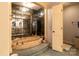 Elegant bathroom featuring a unique tub and a mirrored wall design at 404 Downing Dr, Kings Mountain, NC 28086