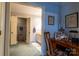 En-suite bathroom entrance with a vanity area and a striped wallpaper design at 404 Downing Dr, Kings Mountain, NC 28086