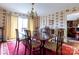 Bright dining room featuring wallpaper, a large table, and natural light at 404 Downing Dr, Kings Mountain, NC 28086