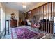 Inviting foyer with a decorative screen, antique furnishings, and tile flooring at 404 Downing Dr, Kings Mountain, NC 28086