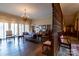 Elegant living room featuring hardwood floors, decorative chandelier, and French doors at 404 Downing Dr, Kings Mountain, NC 28086
