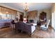 Cozy living room with a stone fireplace, hardwood floors, and classic furnishings at 404 Downing Dr, Kings Mountain, NC 28086