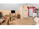 Attic featuring a TV, furnishings, and decor with a laundry closet in the background at 417 Galesburg Dr, Monroe, NC 28110