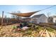 Backyard oasis featuring a charming pond with a rock path and landscaping at 417 Galesburg Dr, Monroe, NC 28110