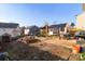Backyard features a shed, patio, and grassy area for entertaining and recreation at 417 Galesburg Dr, Monroe, NC 28110