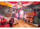 Themed bedroom with lots of wall decor and a ceiling fan with flag decorations at 417 Galesburg Dr, Monroe, NC 28110