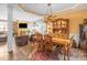 Elegant dining room with decorative chandelier and a spacious wooden table at 417 Galesburg Dr, Monroe, NC 28110