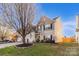 Beautiful two-story home displaying a lush lawn and a charming curb appeal at 417 Galesburg Dr, Monroe, NC 28110