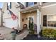 Close-up of the home's inviting entrance and covered porch at 417 Galesburg Dr, Monroe, NC 28110