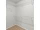 Walk-in closet with wire shelving and neutral carpet at 419 N Caldwell St # 1, Salisbury, NC 28144