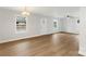 Spacious living room with light-colored walls, hardwood floors, and natural light at 419 N Caldwell St # 1, Salisbury, NC 28144
