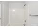 Bright bathroom featuring a tub and shower combination and a chrome towel bar at 423 N Caldwell St # 2, Salisbury, NC 28144