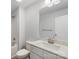 Bright bathroom featuring a vanity with a modern faucet, a large mirror and a shower with tub at 423 N Caldwell St # 2, Salisbury, NC 28144