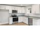 Kitchen features stainless appliances, granite countertops, modern hardware, and white cabinetry at 423 N Caldwell St # 2, Salisbury, NC 28144