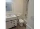 Updated bathroom with stylish vanity and tiled shower at 425 Whitethorn Dr, Gastonia, NC 28054
