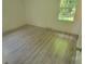 Bedroom showcasing new floors, neutral walls and a light filled window at 425 Whitethorn Dr, Gastonia, NC 28054