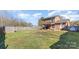 The large backyard features a wooden fence and a shed for extra storage at 4405 Ashton Ct, Indian Trail, NC 28079