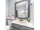 Bathroom features a single sink vanity and a shower with a tub at 4405 Ashton Ct, Indian Trail, NC 28079