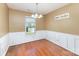 Cozy dining room with natural light and classic wainscoting at 4405 Ashton Ct, Indian Trail, NC 28079