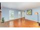 Bright living room with hardwood floors, natural light, and fresh wall color at 4405 Ashton Ct, Indian Trail, NC 28079