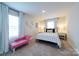 Bedroom with a large window with decor and furniture at 50 Sherwood Nw Ct # Sw50, Concord, NC 28027